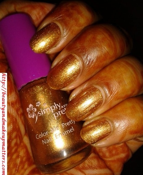 Avon-Simply-Pretty-Nail-Polish-Glitter-Gold-NOTD