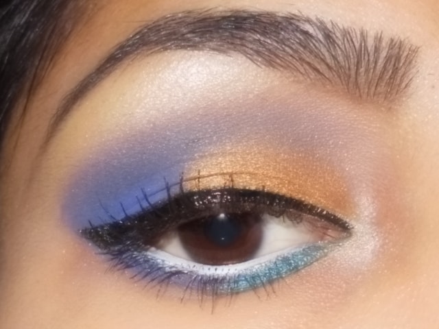 Purple and Gold Eye Makeup with White Waterline
